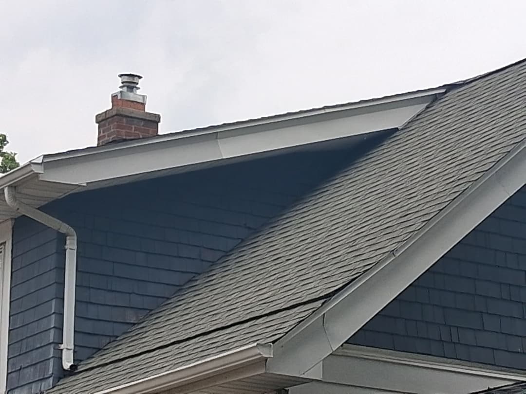 Roof repair before and after example for ridge issues